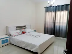 Furnished Master Bedroom with attached bathroom and balcony