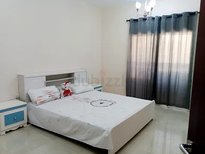 Furnished Master Bedroom with attached bathroom and balcony