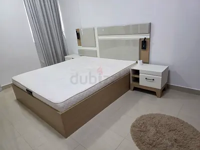 Light Wood king-size Bed with Headboard and Matching Nightstands - pan emirates, hardly used,, 10/10