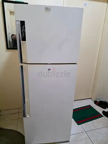 White double-door refrigerator - good working condition