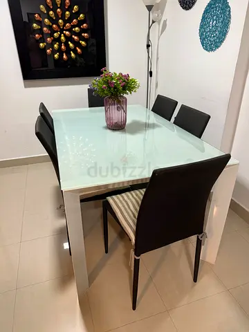 Dinning table with six chairs( must go by today)