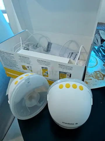 Medela motion in bra double electric  Pump hands free.. out of box but never used