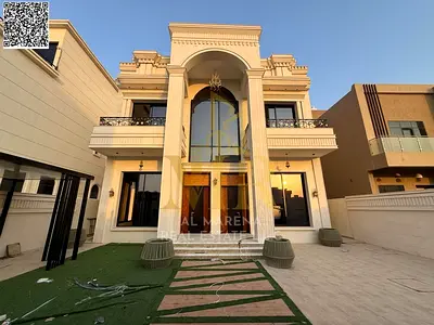 Two-story villa with 5 bedrooms at a special price, including electricity, water, air conditioning, and fees, in one of Ajman's most prestigious areas