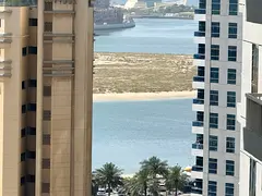 Lowest price 1-bedroom apartment with a balcony, easy access to Dubai, with a side sea view