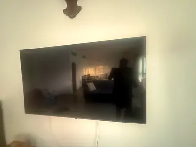 LG 65-inch LED Smart TV (wall-mounted) - Good working condition