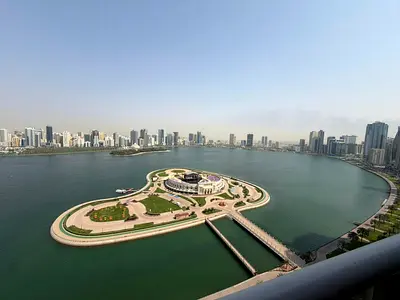 Excellent opportunity for a spacious 3-bedroom apartment with free parking, gym, pool, and a stunning view in Al Majaz 3.