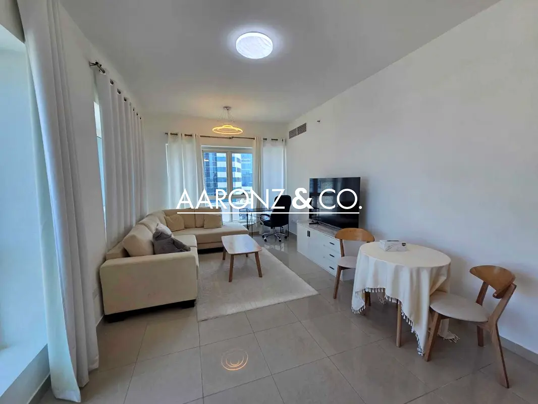 Vacant | Furnished | Upgraded | Balcony |Low Floor