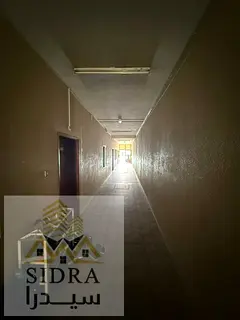 residential and commercial building located on two streets consisting of 10 shops and 25 apartments