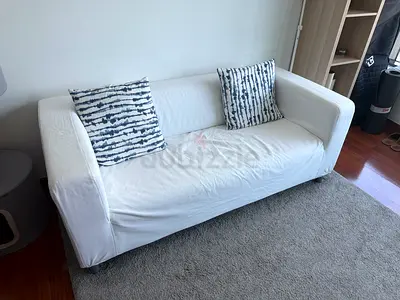 White 2-Seater Sofa with Slipcover and Two Cushions