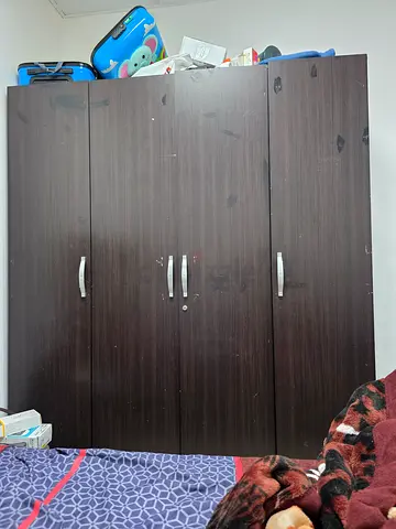 Bed and cupboard