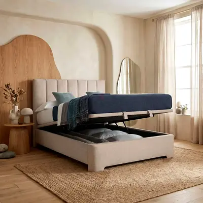 Beige linen upholstered king size storage bed