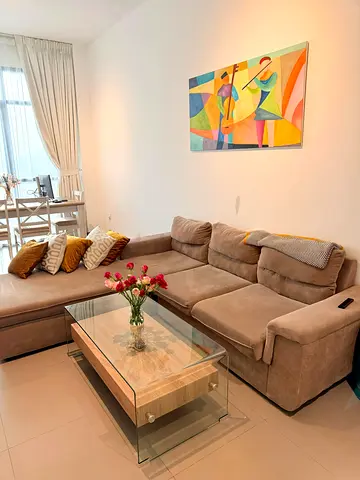 L-shaped beige suede sectional sofa