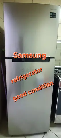 Samsung Silver Top-Freezer Refrigerator - Good Condition