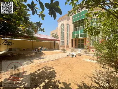 Villa for sale in Ajman Al Rawda, 4 master bedrooms, majlis, living room, and maid's room. Freehold ownership for all nationalities. Bank financing av