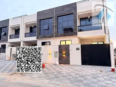 Villa for sale, including registration and ownership fees, with monthly installments starting from 5000 dirhams, on a main street, in a very prime loc