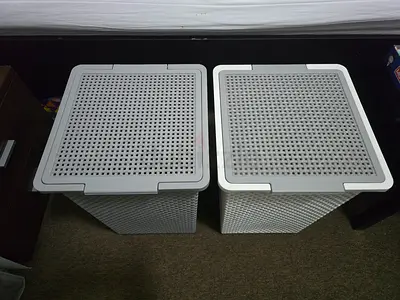 Pair of white plastic laundry hampers / storage baskets (2 pcs)