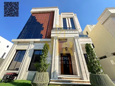 Two-story villa with a swimming pool and rooftop terrace, 5 bedrooms, at a special price including registration fees, in one of Ajman's most prestigio