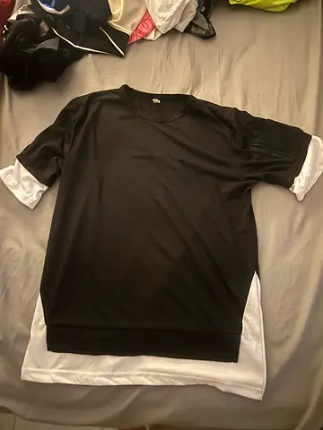 Black short-sleeve crew neck top, good condition size M