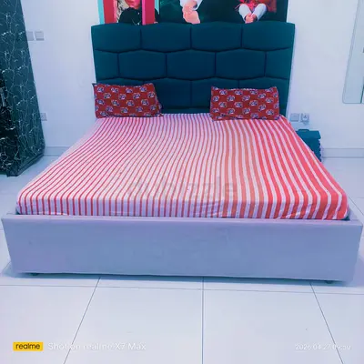 King without storage bed with upholstered headboard - good condition with mattress