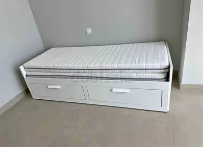 IKEA Brimmness Day bed with 2 storage drawers underneath and with 2 IKEA mattresses