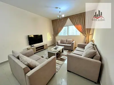 Sharjah Al Taawun, 2-bedroom apartment with living room, kitchen, bathrooms, and balcony