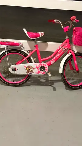 Girls pink 16-inch kids bicycle with basket — good condition
