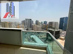 “For Sale: 2-Bedroom Empty Flat in Ajman One Tower – Closed Kitchen, Parking, and Open View”