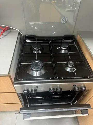 Used freestanding 4-burner gas stove with oven - good working condition