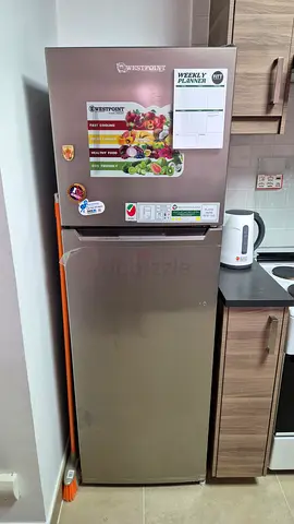Used single-door stainless steel refrigerator - compact, good condition