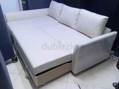 Light Beige Pull-Out Sofa Bed with Cushions - Good Condition