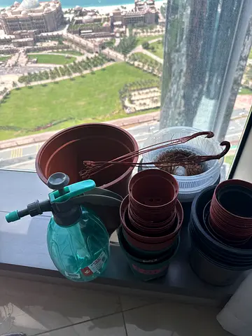 Assorted Plastic Plant Pots and Watering Sprayer - Small Collection