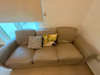 3-seater beige fabric sofa in good condition