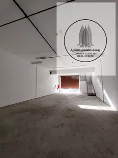 A prime warehouse for rent in Al Jurf Industrial Area 1, with an area of ​​2,875 sq ft and 25 kW