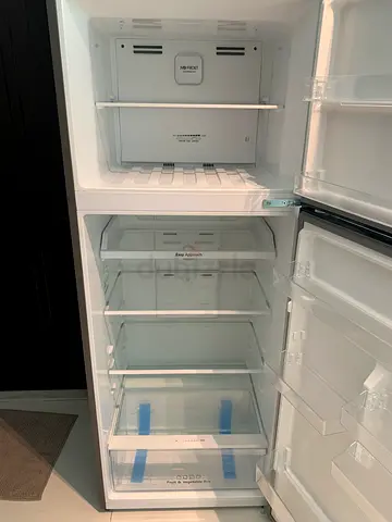 Almost-new double-door refrigerator (well maintained)