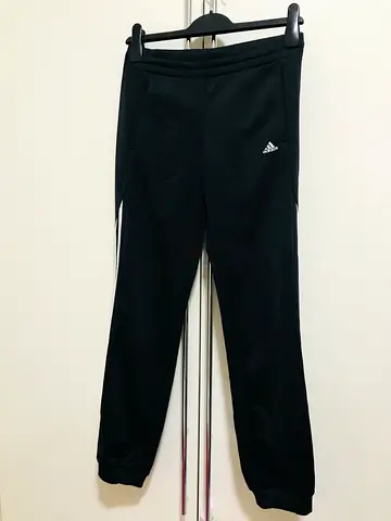 Adidas pants black color for kids 11-12 years old for 60 aed.