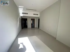 For annual rent in Ajman: a three-bedroom apartment with a living room, first occupancy, three bathr