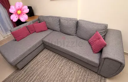 L-shaped grey fabric sofa with chaise - good condition