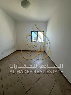 A luxury apartment for rent in Al Majaz 1, Sharjah, featuring a direct sea view (rear view) with a m