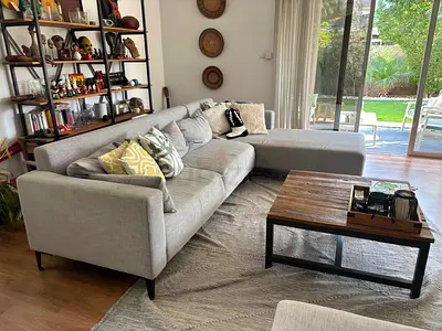 Light grey L-shaped sectional sofa with chaise