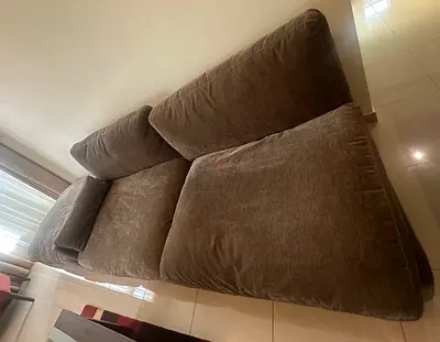 Comfortable 3-seater brown fabric sofa - good condition orginal price 3200