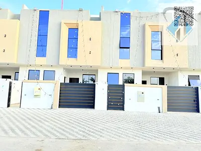 Villa for sale in Ajman, two floors and a roof, price including fees and Electricty And Water