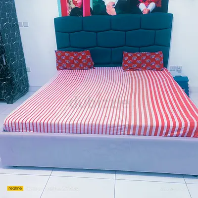 King without storage bed with upholstered headboard - good condition with mattress