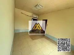 Studio for annual rent in Al Muwaihat 3, Ajman, with a separate kitchen and a prime location close t
