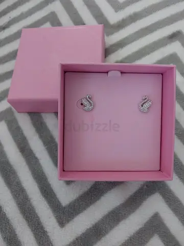 Swan-shaped Swarovski earrings