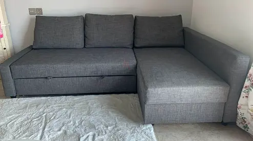 Gray L-shaped Sofa Bed with Storage - Good Condition