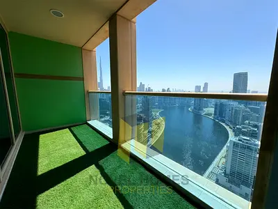 Spacious 2BR | Burj & Canal View | Prime Location