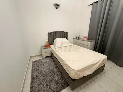 Single upholstered bed with headboard and mattress — good condition