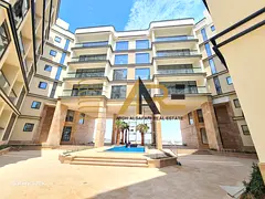Lavish Brand new 2bhk apartment with wardrobes, Balcony, Gym, pool and covered Parking.