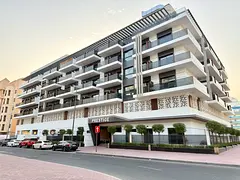 Modern 1BR | Balcony with Open View | Warsan 4