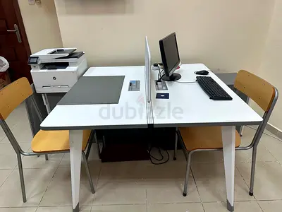 Used Shared Office Desk with Divider, Chairs and Monitor Setup